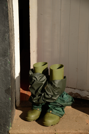 Rubber boots with waterproof pants の写真素材