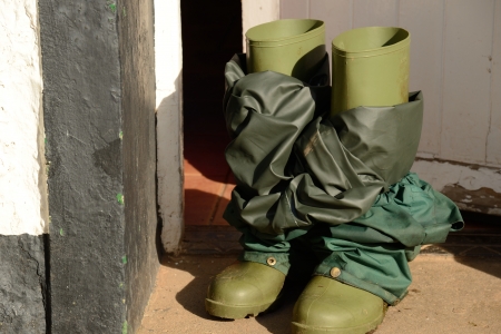 Rubber boots with waterproof pants の写真素材