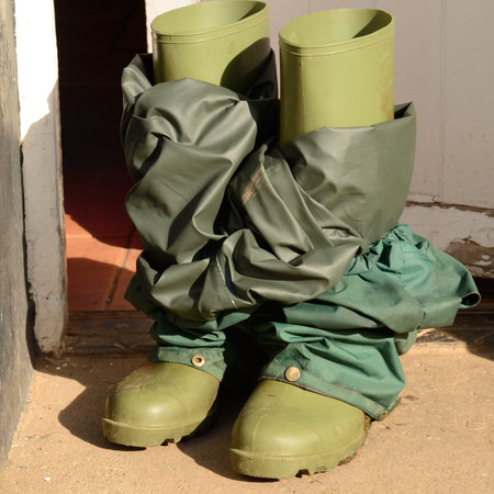 Rubber boots with waterproof pants の写真素材