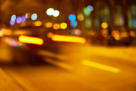 Lens Blur Colorful Bokeh Night Traffic Backgroundの写真素材