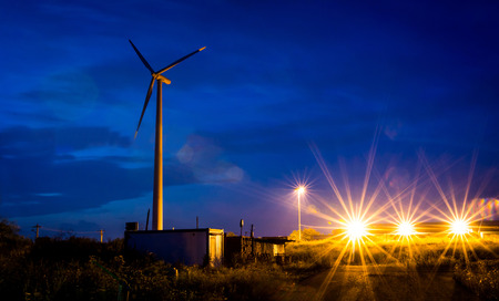 Night scene with wind propeller and lights.の写真素材