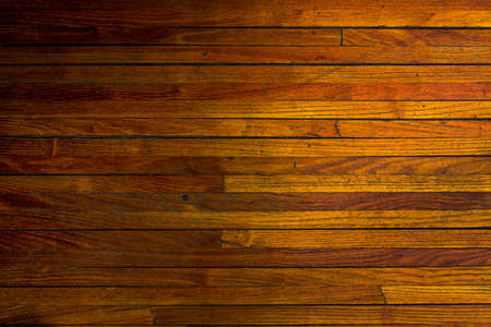 Old brown parquet texture, horizontal stripes.の写真素材