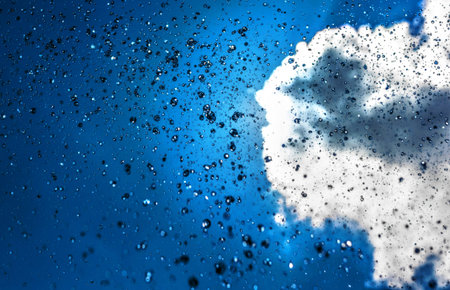 Rain drops and sunny weather.の写真素材