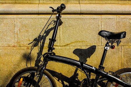 Black bike with big comfortable seat.