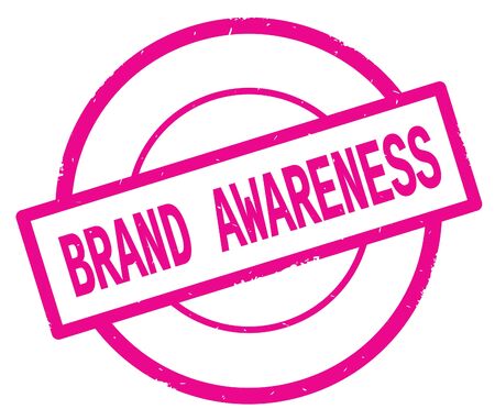 BRAND AWARENESS text, written on pink simple circle rubber vintage stamp.の写真素材