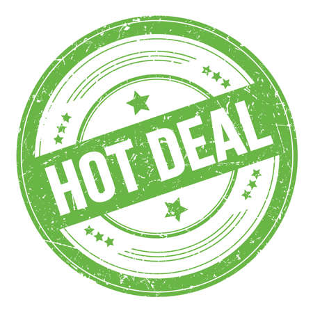 HOT DEAL text on green round grungy texture stamp.の写真素材