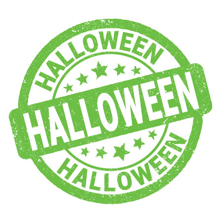 HALLOWEEN text written on green grungy stamp sign.の写真素材