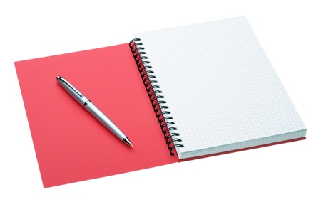 Silver pen laying on the notebook with red cover, isolated on whiteの写真素材