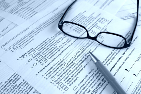 legal, law concept - court form for dissolution of marriage,divorce on the foreground, glasses and a...