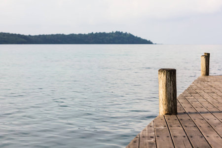 wooden pole on the sea Thailandの写真素材