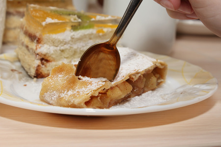 eating delicious homemade strudel and simultaneous tea partyの写真素材