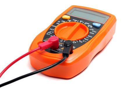 orange multimeter on a white background