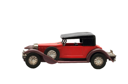 old retro toy car on a white backgroundの写真素材