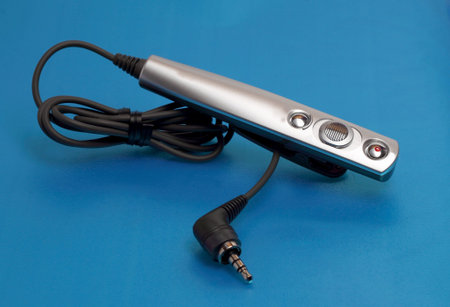 compact wired remote on a blue background