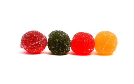 delicious fruit candy on a white backgroundの写真素材