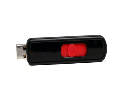 black USB flash drive on a white background