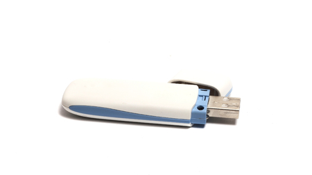 great white USB flash drive on a white backgroundの写真素材