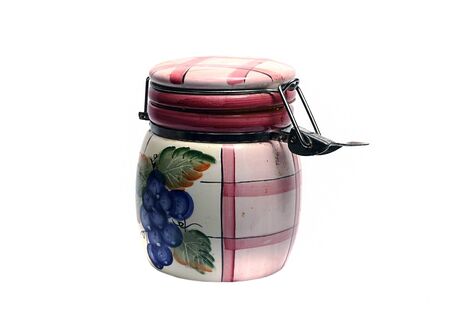 old ceramic jar for loose products on a white backgroundの写真素材