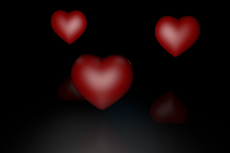 red heart on a black backgroundの写真素材