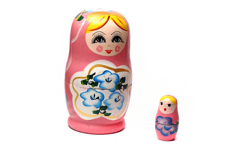 pink Matryoshka dolls on a white backgroundの写真素材