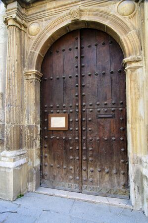Picture of a medieval gate, with old textures.の写真素材