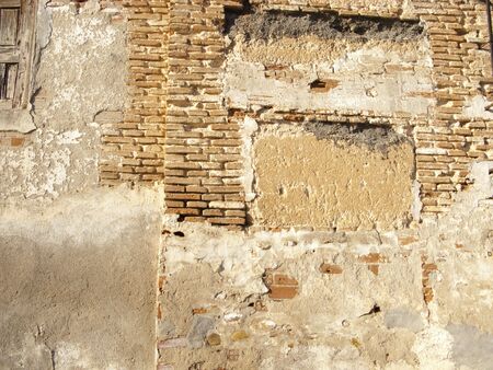 Picture of an old wall in a medieval street.の写真素材