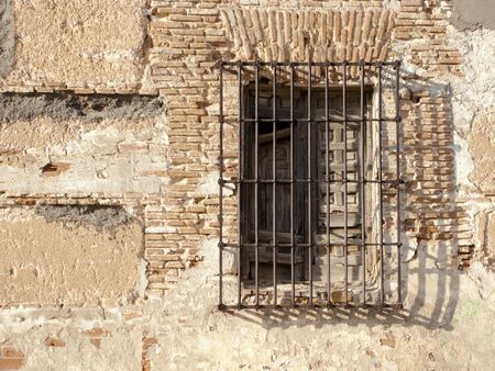 Picture of an old window in a medieval street.の写真素材