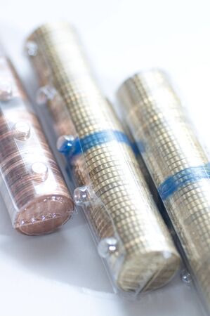 Roll of coins picture over white background. Eurosの写真素材