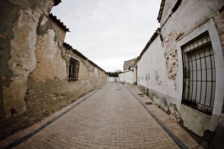 Street with houses made of mud, rural townの写真素材