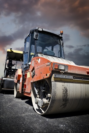 Heavy Vibration roller at asphalt pavement works (road repairing)の写真素材