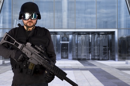 Military defending a business buildingの写真素材