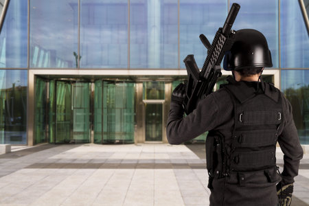 Military defending a business building