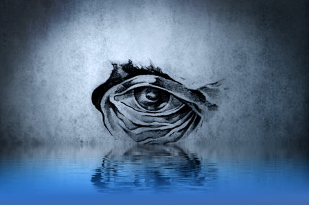 Tattoo animal eye on blue wall with water reflectionsの写真素材