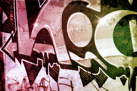 Graffiti over old dirty wall, urban hip hop background Gray texture painted with bright colorfulのeditorial素材