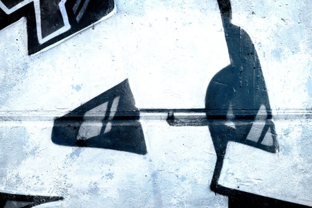 Graffiti over old dirty wall, urban hip hop background Gray texture painted with bright colorfulのeditorial素材