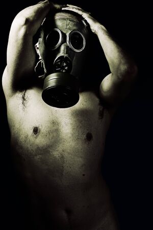 Panic, grunge portrait man in gas maskの写真素材