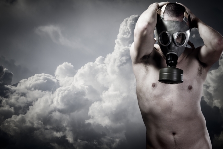 pollution concept: portrait of man in a gas maskの写真素材