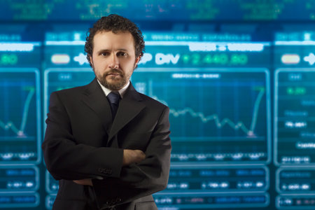 businessman with beard and black suit in the stockmarket, moneyの写真素材