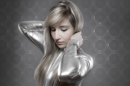 modern concept, beautiful blonde with silver effects, communication and Internetの写真素材