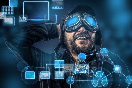 Steampunk concept, happy pilot vintage with big glasses, posing, electronic console