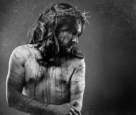 Jesus Christ calvary, man bleeding, representation of passion with crown of thornsの写真素材