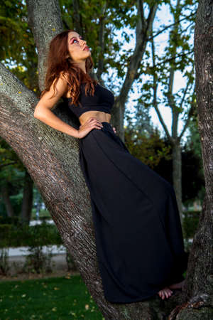 Teenager, Beauty Romantic Girl Outdoor. Beautiful Teenage Model Dressed in Fashionable Short Dressの写真素材