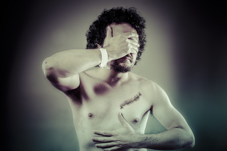 Sad, suicide man concept with great sadness, problems, disdainの写真素材