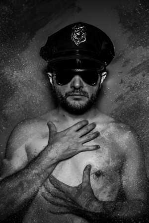 Sexy police concept, dangerous man with sunglassesの写真素材