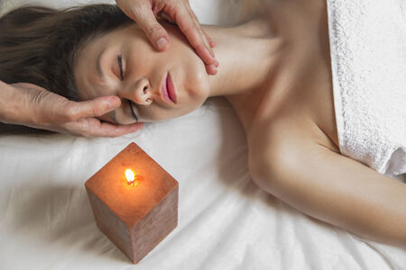 Relax.portrait of young beautiful woman in spa environmentの写真素材