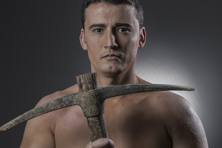 Engineer, Construction worker portrait holding a peak.の写真素材