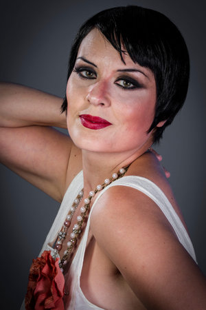 Model, Retro posing lady,  flapper dress, Girl dreaming beautiful young woman from roaring 20s...