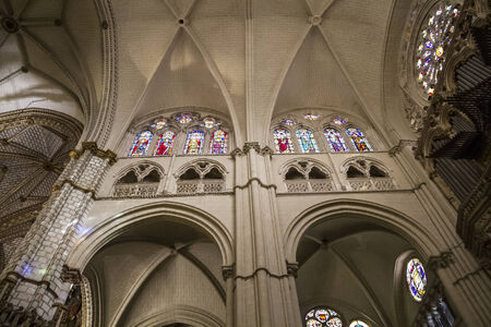 Interior of Toledo Cathedral. Arcs, organ, columns and gothic art. Spainのeditorial素材