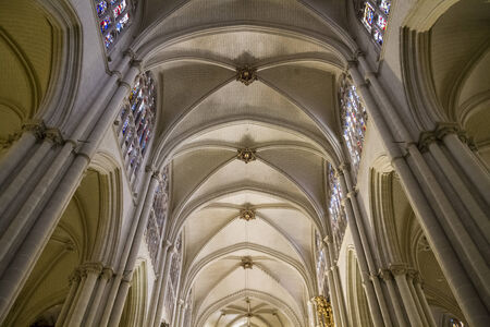 Interior of Toledo Cathedral. Arcs, organ, columns and gothic art. Spainのeditorial素材