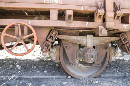 wheels, old freight train, metal machinery detailsのeditorial素材